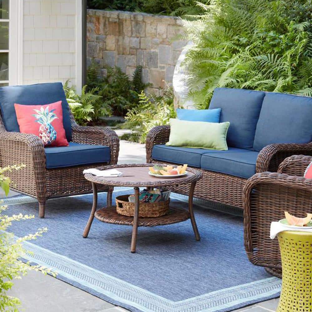 Hampton Bay Cambridge Brown Wicker Outdoor Patio Swivel Rocking Chair with CushionGuard Midnight Navy Blue Cushions 65-17148B4